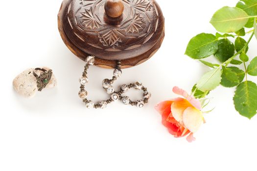 vintage necklace and ring with wooden jewelry box and rose