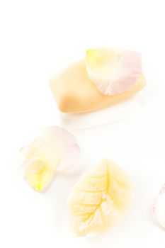 moisturizer beauty cream and soaps with flower petals