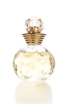back lit yellow womens perfume bottle on white