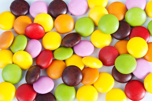 Many colourful halloween candy filling background