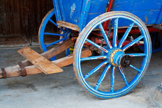 Wagon wheel . Close-Up of an antique wagon wheel located in a fortress.