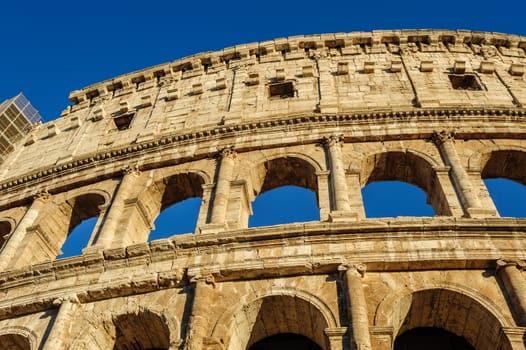 Partial view of ancient Rome Coliseum ruins. Italy, Rome.