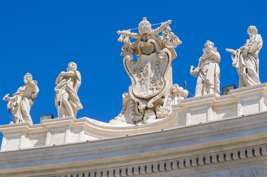 Statues on the roof of St. Peter Cathedral in Rome, Italy