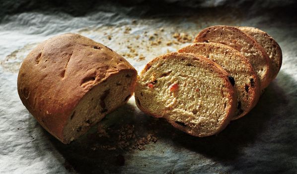 Homemade raisin bread in tray, Still life