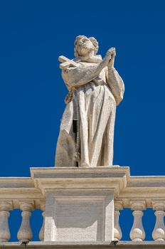 Statues on the roof of St. Peter Cathedral in Rome, Italy