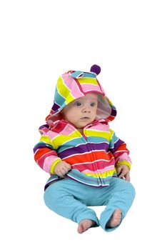 Surprised baby girl with multicolored cardigan isolated on white

