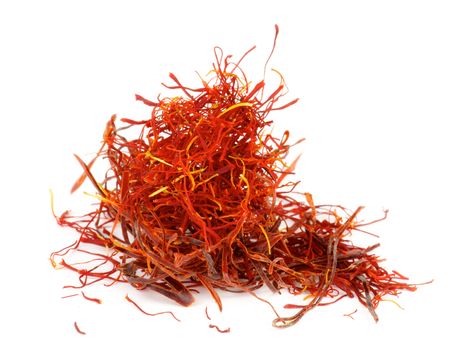 Stack of Perfect Red Dry Saffron isolated on white background