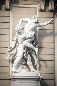 VIENNA, AUSTRIA - AUGUST 4, 2013: Statue of Hercules fighting Antaeus at Hofburg palace entrance, Vienna, Austria