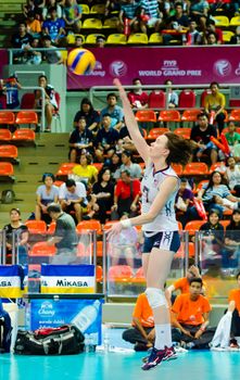 BANGKOK - AUGUST 17: Cassidy Lichtman of USA Volleyball Team in action during The Volleyball World Grand Prix 2014 at Indoor Stadium Huamark on August 17, 2014 in Bangkok, Thailand.