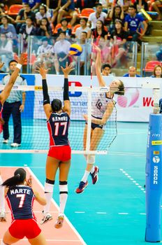 BANGKOK - AUGUST 17: Kelsey Robinson of USA Volleyball Team in action during The Volleyball World Grand Prix 2014 at Indoor Stadium Huamark on August 17, 2014 in Bangkok, Thailand.