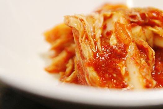 Korean food, close-up kimuchi on white dish