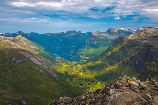 The Geiranger fjord in Norway, surrounded by high mountains