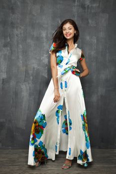 Glamour Portrait of young woman in white summer dress