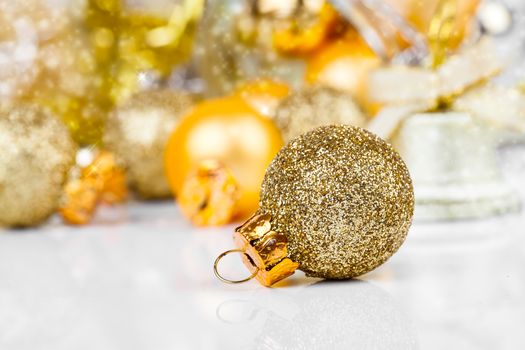 Red christmas ornaments with golden christmas bauble