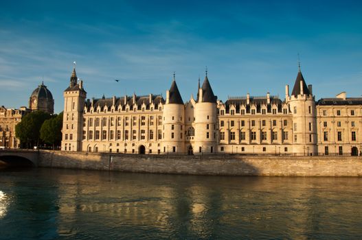 conciergerie castle with Seine river in Paris