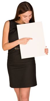 Businesswoman in dress holding and looking at blank sheet of white paper