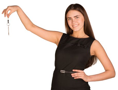 Businesswoman in dress holding house key. Isolated on white background