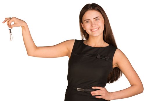 Businesswoman in dress holding house key. Isolated on white background