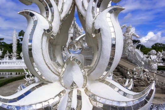 Architectural Details and Ball of Wat Rong Khun. Buddhist temple in Chiang Rai, Thailand.