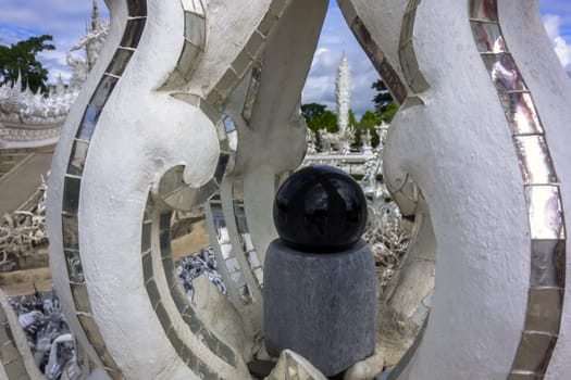 Black Ball in Wat Rong Khun. Buddhist temple in Chiang Rai, Thailand.