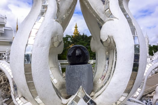 Black Ball of Wat Rong Khun. Buddhist temple in Chiang Rai, Thailand.