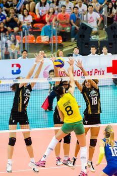 BANGKOK - AUGUST 17: Jaqueline Maria Pereira de Carvalho Endres of Brazil Volleyball Team in action during The Volleyball World Grand Prix 2014 at Indoor Stadium Huamark on August 17, 2014 in Bangkok, Thailand.