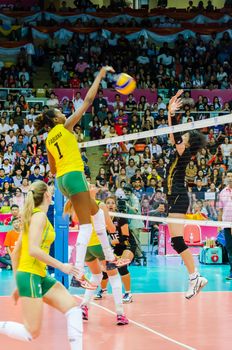 BANGKOK - AUGUST 17: Fabiana Claudino of Brazil Volleyball Team in action during The Volleyball World Grand Prix 2014 at Indoor Stadium Huamark on August 17, 2014 in Bangkok, Thailand.