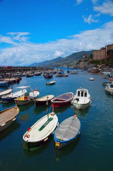 Boats in port with wonderful blue sea and sky in front