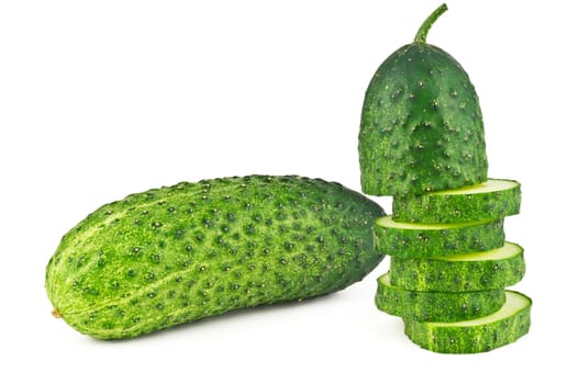 One young whole cucumber and five slices on white background