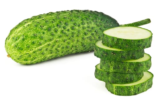 One young whole cucumber and five slices on white background