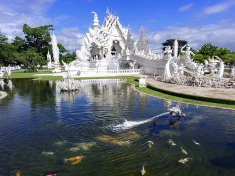 Head Of Dragon Fountain. White Temple, is a contemporary unconventional Buddhist temple in Chiang Rai