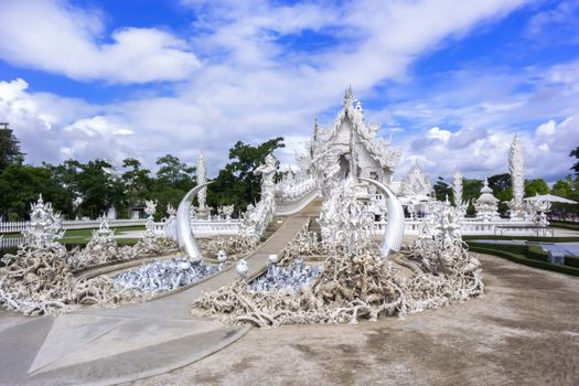 Main Entrance of White Temple, is a contemporary unconventional Buddhist temple in Chiang Rai, Thailand.