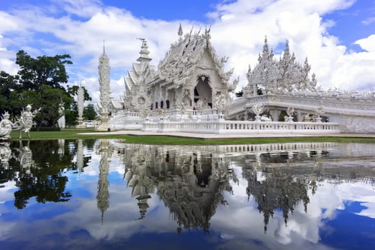 Reflections of White Temple, is a contemporary unconventional Buddhist temple in Chiang Rai, Thailand.