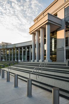 Sign and entrance steps to modern building housing the Colorado Supreme Court and Court of Appeals in Denver CO