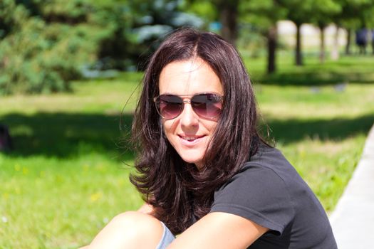 Portrait of European beautiful woman with black hair