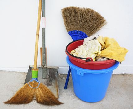 Housework supplies include broom, dustpan,
buckets of water and wipes.                            