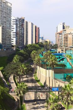 LIMA, PERU - FEBRUARY 20, 2012: The street Bajada Balta with the Club Tennis Las Terrazas on one side and residential buildings on the other in the district of Miraflores on February 20, 2012 in Lima, Peru. Miraflores is one of the most modern and richest districts of Lima. 