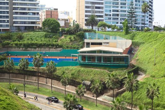 LIMA, PERU - MARCH 24, 2012: The tennis club "Club Tennis Las Terrazas" situated between the streets Bajada Balta and Malecon 28 de Julio in the district of Miraflores on March 24, 2012 in Lima, Peru. Miraflores is one of the most modern and richest districts of Lima. 