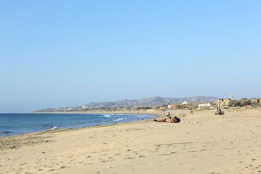 LOS ORGANOS, PERU - AUGUST 30, 2013: Sandy beach on August 30, 2013 in Los Organos, Peru. Los Organos is a small town in Northern Peru, close to the popular beach town of Mancora. 