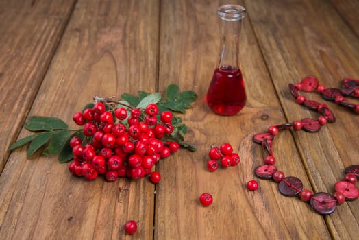 rowanberries on wooden table