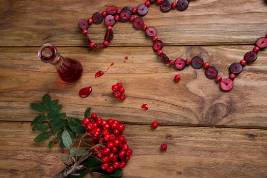 rowanberries on wooden table