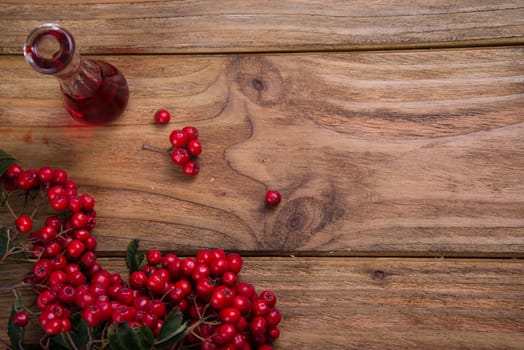 rowanberries on wooden table