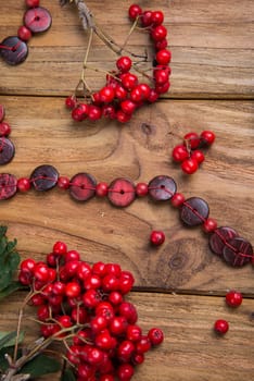 rowanberries on wooden table