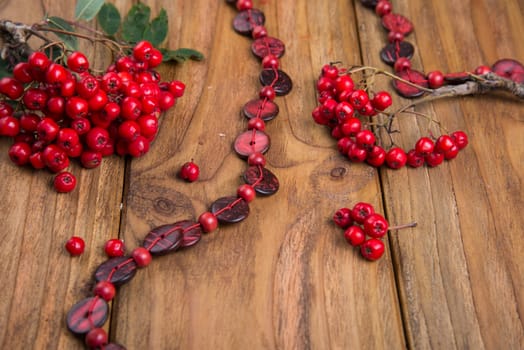 rowanberries on wooden table