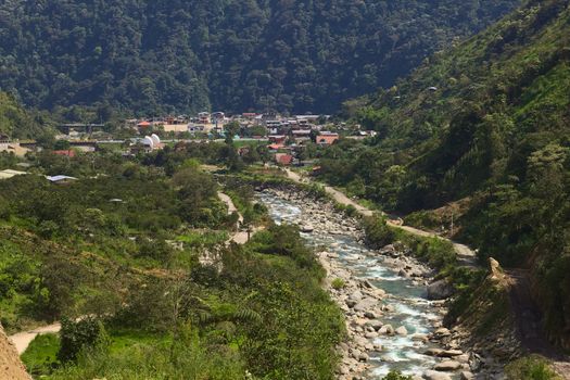 RIO VERDE, ECUADOR - FEBRUARY 17, 2014: View onto the small town of Rio Verde amongst lush vegetation on February 17, 2014 in Rio Verde, Ecuador. Rio Verde is a small town along the road between Banos and Puyo in Central Ecuador. 