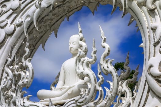 Architectural Details of White Temple. Sitting Buddha.