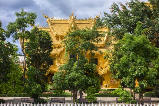 Golden Lavatory of White Temple. Contemporary unconventional Buddhist temple in Chiang Rai, Thailand.