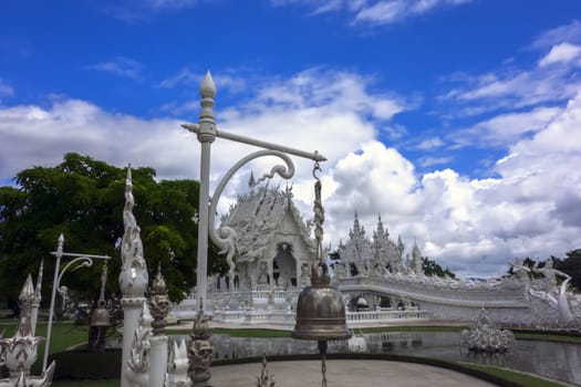 Architectural Details of White Temple. Bell. Contemporary unconventional Buddhist temple in Chiang Rai, Thailand