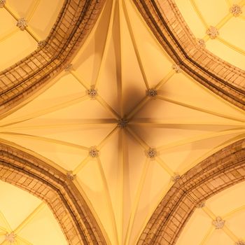 Dome of small Scottish cathedral, yellow lights