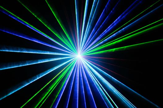 Laser beams on a black background